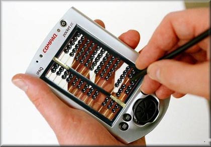 I found this photoshopped image of a PDA with the screen removed and turned into an abacus.  Hilarious!